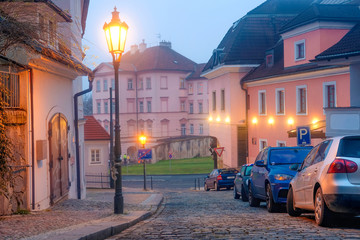 Fototapeta premium Prague, Czechia - November, 21, 2016: cars on a parking in the center of Prague, Czechia