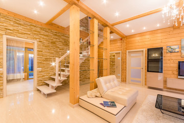 Interior of a modern living room with a staircase