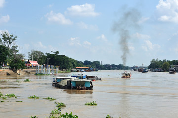Naklejka premium CHAO PRAYA River with transportation boat in Thailand.
