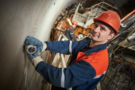 underground metro railway builder at tunnel construction work