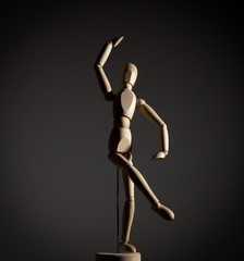 The wooden figure of a man