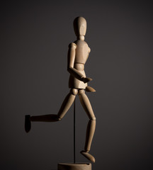 The wooden figure of a man