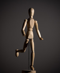 The wooden figure of a man