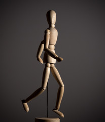 The wooden figure of a man