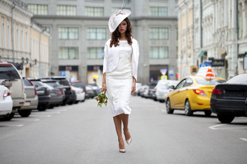Fototapeta premium Young beautiful model in a stylish designer clothes
