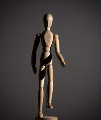 The wooden figure of a man