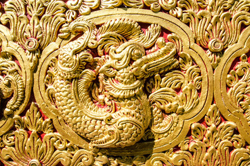 Close Up Beautiful StuccoThai Traditional Art Fantastic Beast or Animal(Lai Thai) Handmade Background Wallpaper Texture