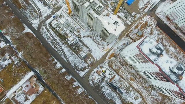 Construction of high-rise buildings in the winter. Aerial view.  