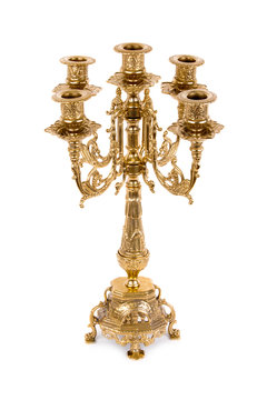 Vintage golden candlestick on white background