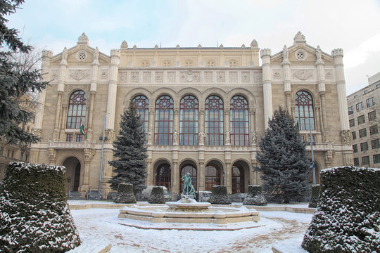 Vigado Concert Hall with fountain statue on the Danube Promenade in winter, Budapest, Hungary.