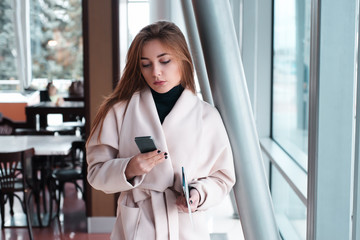 Woman in waiting room of  international airport.