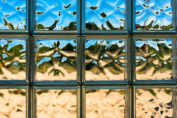 Whimsical distortions in a glass block window