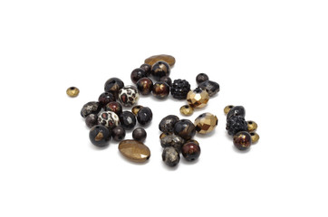 Decorative colorful beads scattered on white background - accessories for handmade and hobby