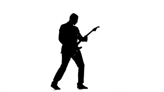 Silhouette of guitarist playing viewer. Electric bass guitar