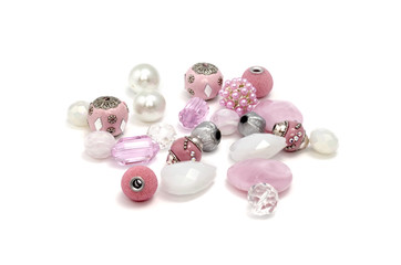 Decorative colorful beads scattered on white background - accessories for handmade and hobby