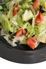 Chinese food. Green salad with cucumber and tomato