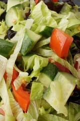 Chinese food. Green salad with cucumber and tomato