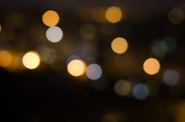 Obraz premium Christmas festive abstract holidays background with bokeh defocused lights and stars