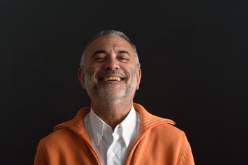 Portrait of a man with black background