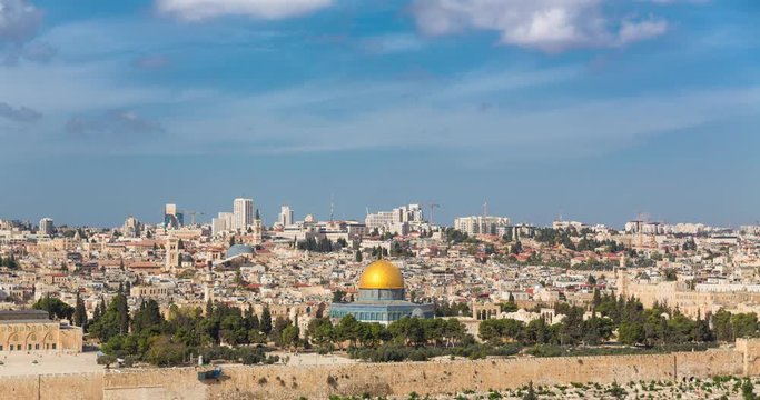 Panoramic view to Jerusalem Old city and the Temple Mount, Dome of the Rock and Al Aqsa Mosque from the Mount of Olives in Jerusalem, Israel, - Time Lapse, Pan Right