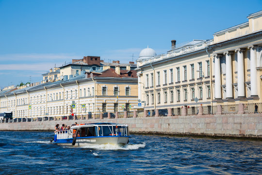 Tourist boat on the river Neva in St. Petersburg
