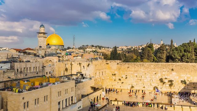 View to Western Wall known at the Wailing Wall or Kotel in Jerusalem is a major Jewish sacred place, Old city and the Temple Mount, Dome of the Rock and Al Aqsa Mosque - Time Lapse
