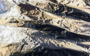 Crumpled Aluminum Tin Foil Surface Background