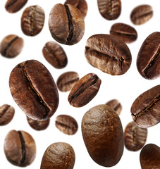 Roasted coffee beans on white background