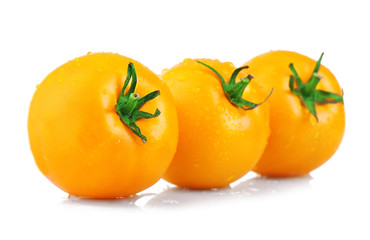 Yellow ripe tomatoes isolated on white