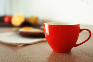 Cup of morning tea on kitchen table