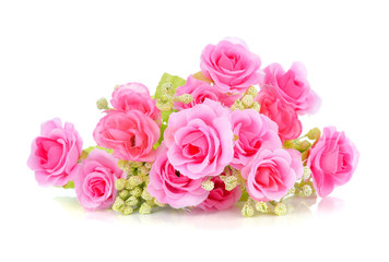 Artificial rose on white background.