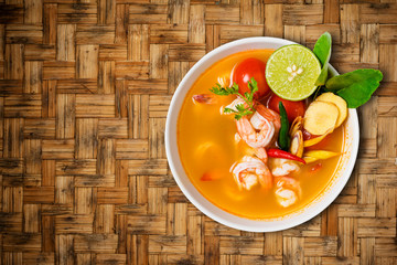 Tom yam kong or Tom yum, Tom yam is a spicy clear soup typical i