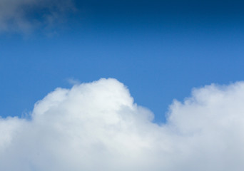white clouds against blue sky
