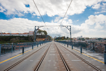 Fototapeta na wymiar Travel, Portugal, Porto,Dom Luis 1 Bridge / World heritage に指定された街に架かるDom Luis 1 橋とTram の線路です。