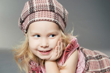 smiling child girl in hat