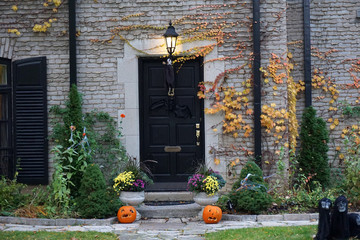 front door of house with Halloween decorations