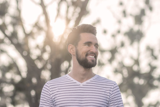 Smiling Young Adult Man, Looking Sideways, Head Face.