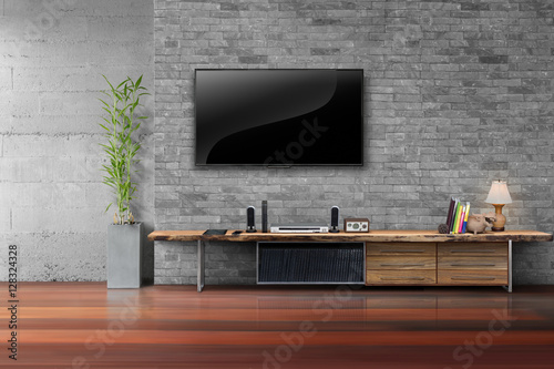 Living Room Led Tv On Brick Wall With Wooden Table Stock Photo And