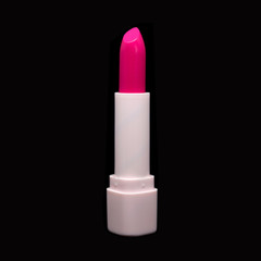 Closeup colorful lipstick isolated on black background.