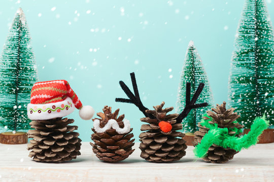 Christmas holiday concept with pinecorn decorations on wooden table