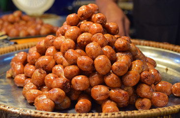 Fried northeastern spicy sausage of Thailand. Local food made from pork and rice. Native and street food.