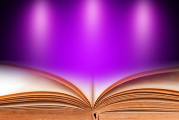 Abstract magic book on wooden background

