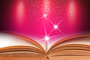 Abstract magic book on wooden background
