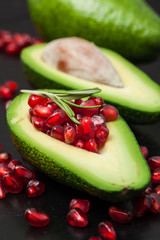 Pomegranate and avocado. Juice. Useful fruit. Appetizing. For your design.