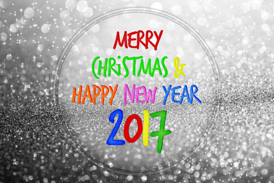 colorful word Merry Christmas and Happy new year 2017 on silver