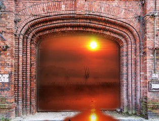 Brick gate and sunrise