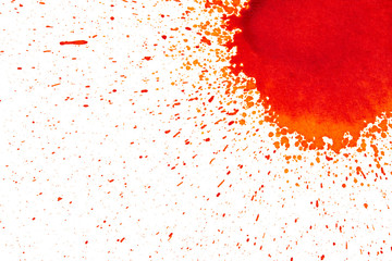 Red watercolor paint splatter