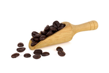 Coffee beans in  wooden scoop on white background