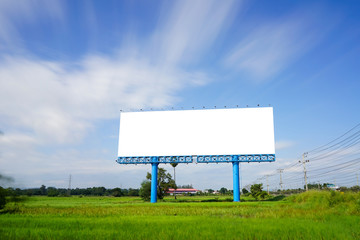 Blank billboard for advetising at rice field with moving cloud o