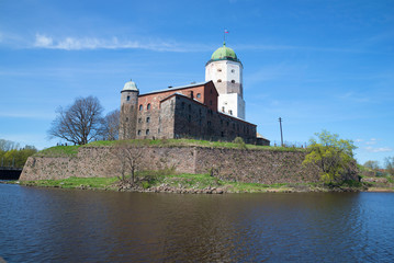 Fototapeta na wymiar View of the Vyborg Castle on a sunny day in May. Leningrad, Russia